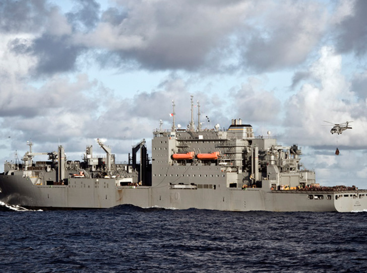 101229-N-2055M-021
PACIFIC OCEAN (Dec. 29, 2010) An HH-60H Sea Hawk helicopter assigned to Helicopter Anti-Submarine Squadron (HS) 15 carries a load of supplies off the deck of the Military Sealift Command dry cargo and ammunition ship USNS Wally Schirra (T-AKE 8) during a vertical replenishment with the aircraft carrier USS Carl Vinson (CVN 70). Carl Vinson and Carrier Air Wing (CVW) 17 are on a deployment to the U.S. 7th and U.S. 5th Fleet areas of responsibility. (U.S. Navy photo by Mass Communication Specialist 3rd Class Travis K. Mendoza/Released)